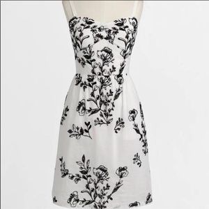 White summer dress with black embroidery detail